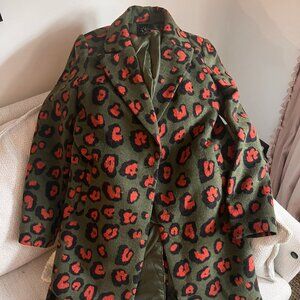 Funky green coat with orange leopard print